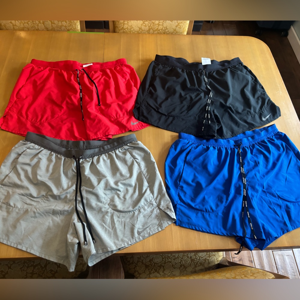 Set of 4 men’s Nike DriFit Running shorts